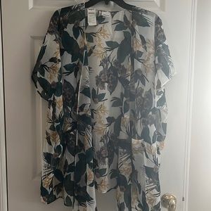 Sonoma cover up or can go over any shirt. One size fits most.